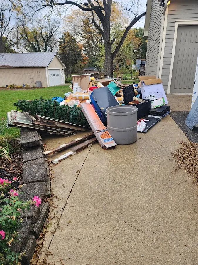 Dumpster being loaded with debris for 3 Yard Dumpster Rental in Freemansburg